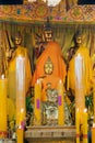 Golden sitting Buddhan inside of Phrabuddhabat Woramahavihan temple. Royalty Free Stock Photo