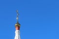 Golden small dome with cross of church