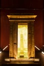 Replica golden small egyptian shrine indoors inside exhibition dark and no people archaeology religion