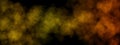 Golden smoke or fog in black background. Royalty Free Stock Photo