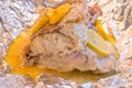 Golden snapper with lemon baked in foil