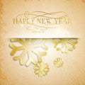 Golden snowflakes on paper background