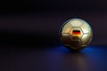 Golden soccer ball on dark background, 3d rendering, sports background, soccer competition, world cup, Football championship light