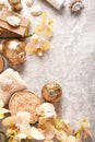 Golden spa concept with orchid, shells, sea salt. Top view. Royalty Free Stock Photo