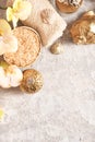 Golden spa concept with orchid, shells, sea salt. Top view. Royalty Free Stock Photo