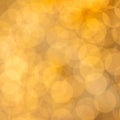 Golden sparkling lights festive background. Abstract twinkled bright bokeh glitter card Royalty Free Stock Photo