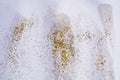 Golden sparkling lights, winter waxy abstract background