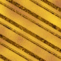 Golden sparkling paper. Luxury metallic foil gold texture. Stripes pattern on background. Festive seasonal sheet. Royalty Free Stock Photo