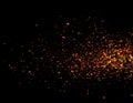 Golden Sparks and Fire Particles Flying with Glittering Effect on Black Background Royalty Free Stock Photo