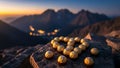 Golden Spheres on Mountain Edge at Sunset Royalty Free Stock Photo