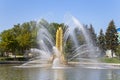 Golden Spike fountain on Kamensky pond in VDNH park. Moscow, Russia