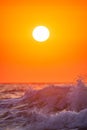 Golden splashing waves and sunrise sea, surfing ocean wave