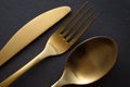 Golden spoon, knife and fork