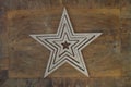 golden star isolated on wooden background Royalty Free Stock Photo