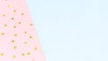 Golden star sprinkles on double pink and blue. Festive holiday b Royalty Free Stock Photo