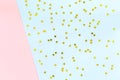 Golden star sprinkles on double pink and blue. Festive holiday b Royalty Free Stock Photo