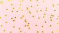 Golden star sprinkles on pink. Festive holiday background. Celeb Royalty Free Stock Photo