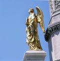 Golden statue of angel on the Kaptol square, Zagreb, Croatia