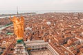 Golden statue of angel on top of clock tower in St Mark`s Square Royalty Free Stock Photo