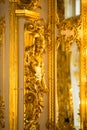 Golden statue in ballroom of roccoco palace Catherine Palace,  located in the town of Tsarskoye Selo or Pushkin St. Petersburg Royalty Free Stock Photo