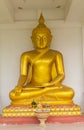 Golden Statue Of Buddha Sitting In Lotus.