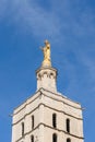 Golden statue on church spire, Avignon, France