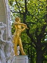 Golden statue of famous composer Johann Strauss at Stadtpark, downtown Vienna