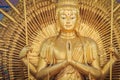 Golden statue of Guan Yin with 1000 hands. Guanyin or Guan Yin i