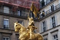 Golden statue of Joan of Arc on horseback