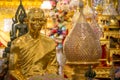 Golden statue of King Bhumibol Adulyadej during monkhood Royalty Free Stock Photo