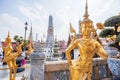 Golden statue of Kinnari at Grand Palace, Thailand