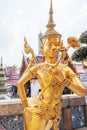 Golden statue of Kinnari at Grand Palace, Thailand