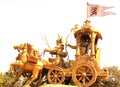 Bhilai, Chhattisgarh, India - October 26, 2009 Golden statue of Lord Krishna and Arjuna on chariot Royalty Free Stock Photo