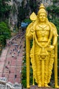 The golden statue of lord Muragan outside the Batu caves Hindu shrine in Kuala Lumpur in Malaysia Royalty Free Stock Photo