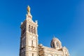 Golden Statue of the Madonna Holding the little Jesus Royalty Free Stock Photo