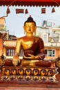 Golden statue of a meditating Buddha Royalty Free Stock Photo