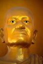 Golden Statue of a monk symbolic image head and face closeup Thailand Royalty Free Stock Photo