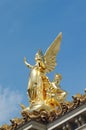 GOLDEN STATUE AT OPERA GARNIER IN PARIS, POETRY BY CHARLES GUMERY Royalty Free Stock Photo