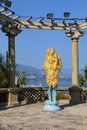 Golden statue at the terrace in Botanical Garden, Les Revories q