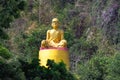 Golden Statue of unnamed monk with glasses symbolic image closeup Thailand Wat Royalty Free Stock Photo