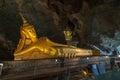 Golden statues of buddha in cave temple Wat Tham Suwankhuha cave Monkey Cave In Phang Nga, Thailand Royalty Free Stock Photo