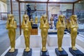 Golden statuettes depicting pharaoh in Egyptian Museum in Cairo, Egypt