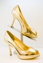 Golden stiletto high heels