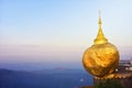 Golden stone of faith on mountain in Myanmar