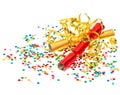 golden streamer, party cracker and confetti over white background