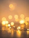 Golden String Lights with Festive Bokeh Background Royalty Free Stock Photo
