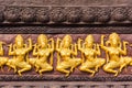 Golden stucco of the angle at the wall of Thai temple Royalty Free Stock Photo