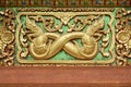 Golden stucco wall art in Thai temples Royalty Free Stock Photo