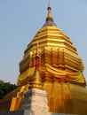 Golden stupa in a Buddhist Temple in Thailand Royalty Free Stock Photo