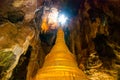 Golden stupa inside the sacred cave. Hpa-An, Myanmar. Burma.